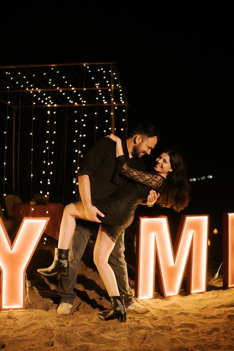 Romantic beach anniversary setup for a couple in Diu