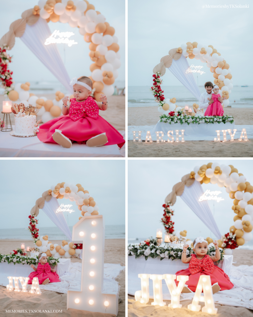 Family celebrating baby girl's first birthday at Diu Beach with cake and decorations